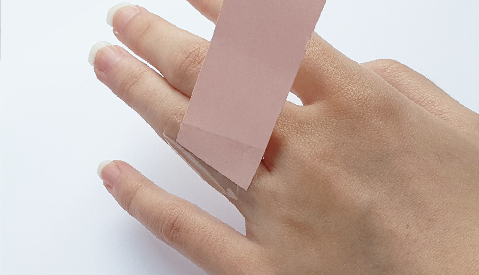 Wrap paper around finger